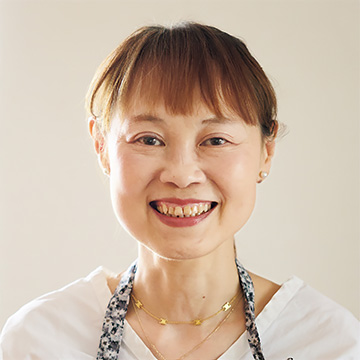 堤 人美